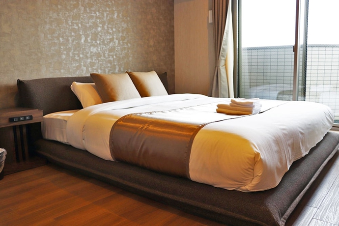 Imagen de la habitación del Hotel Ostay Vermillion Namba. Foto 2