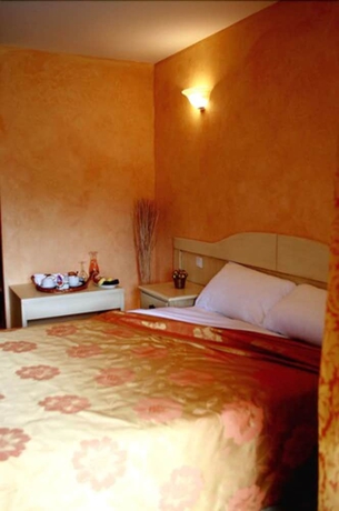 Imagen de la habitación del Hotel Osteria A Stalla Sischese. Foto 6