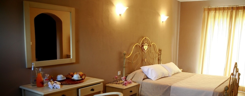 Imagen de la habitación del Hotel Osteria A Stalla Sischese. Foto 11