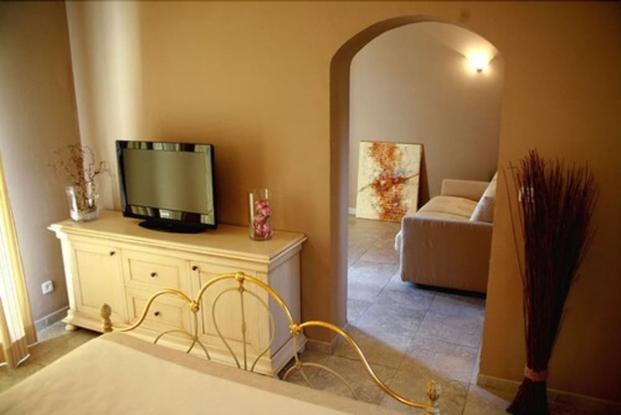 Imagen de la habitación del Hotel Osteria A Stalla Sischese. Foto 15