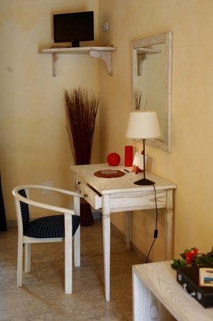 Imagen de la habitación del Hotel Osteria A Stalla Sischese. Foto 17