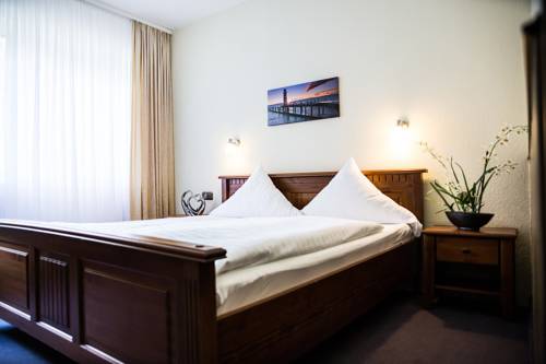 Imagen de la habitación del Hotel Ostfriesen-hof. Foto 7