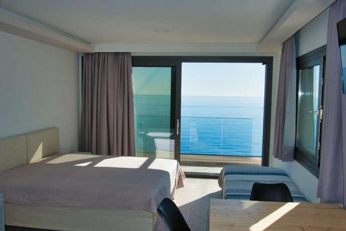 Imagen de la habitación del Hotel Ostria Apartments. Foto 18