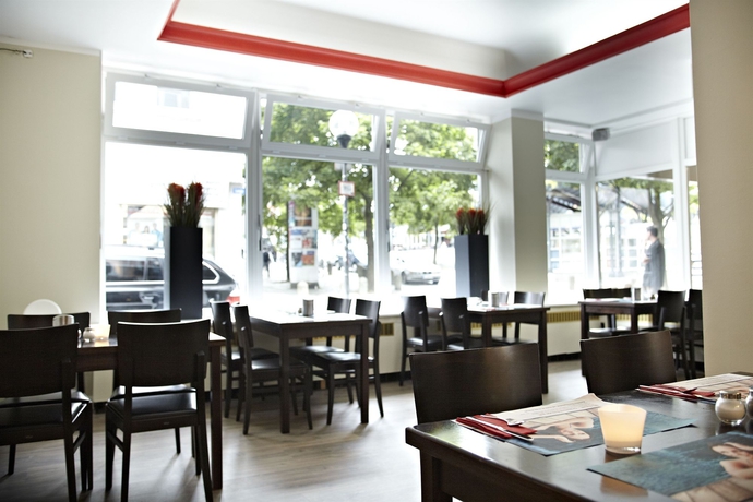 Imagen del bar/restaurante del Hotel Ostseehalle Kiel By Premiere Classe. Foto 5