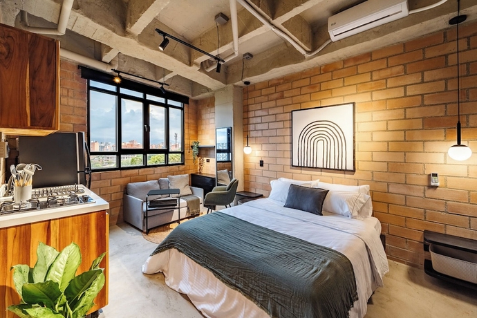 Imagen de la habitación del Hotel Otalu Suites. Foto 1
