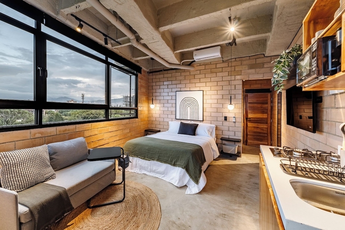 Imagen de la habitación del Hotel Otalu Suites. Foto 5