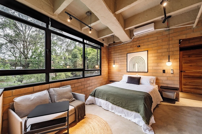 Imagen de la habitación del Hotel Otalu Suites. Foto 7