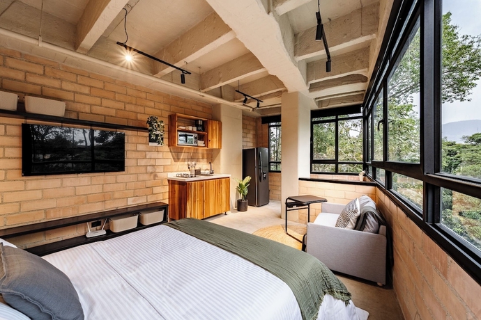 Imagen de la habitación del Hotel Otalu Suites. Foto 8