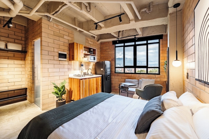 Imagen de la habitación del Hotel Otalu Suites. Foto 9
