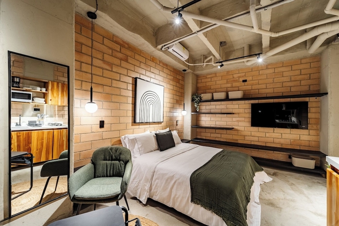 Imagen de la habitación del Hotel Otalu Suites. Foto 10