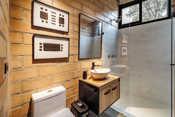 Imagen de la habitación del Hotel Otalu Suites. Foto 12