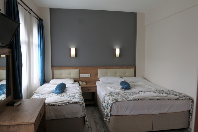 Imagen de la habitación del Hotel Otel Eroglu. Foto 5