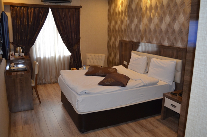 Imagen de la habitación del Hotel Otel Le Grand. Foto 6
