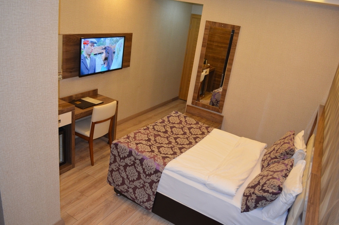 Imagen de la habitación del Hotel Otel Le Grand. Foto 7