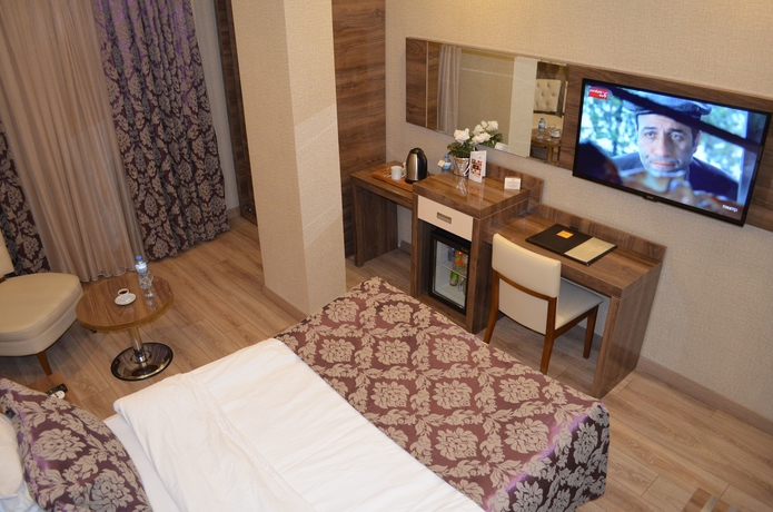 Imagen de la habitación del Hotel Otel Le Grand. Foto 17