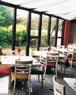 Imagen del bar/restaurante del Hotel Othon Flat Bienal First Class. Foto 2