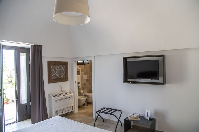 Imagen de la habitación del Hotel Ottolire Resort. Foto 7