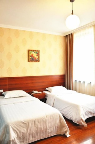 Imagen de la habitación del Hotel Ou Lu Business. Foto 4