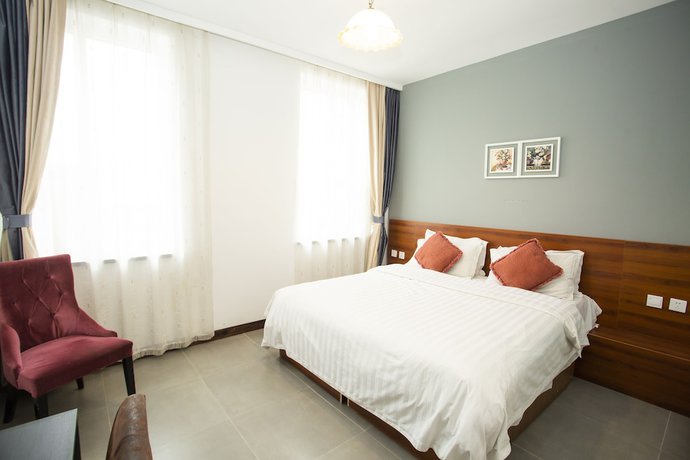 Imagen de la habitación del Hotel Ou Lu Business. Foto 6