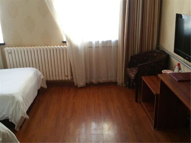 Imagen de la habitación del Hotel Ou Lu Business. Foto 7