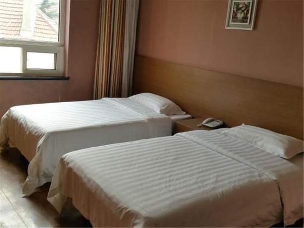 Imagen de la habitación del Hotel Ou Lu Business. Foto 9