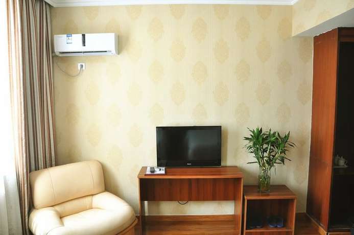 Imagen de la habitación del Hotel Ou Lu Business. Foto 11