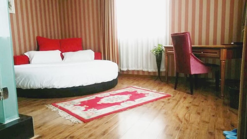 Imagen de la habitación del Hotel Ou Lu Business. Foto 12