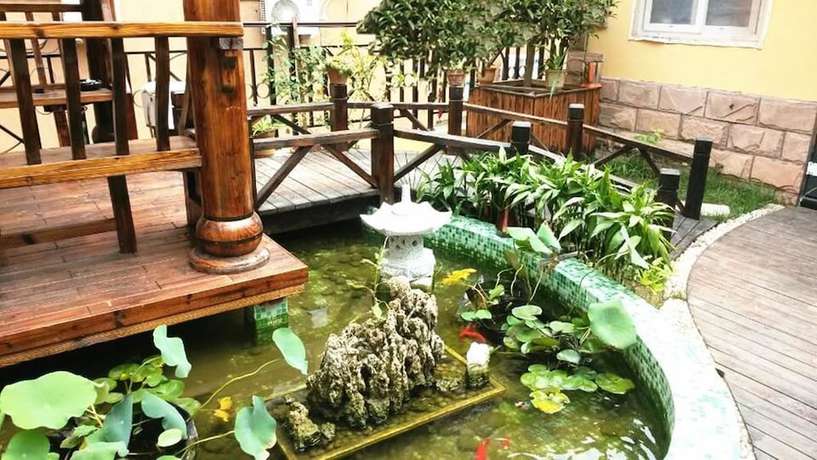 Imagen de los exteriores del Hotel Ou Lu Business. Foto 15