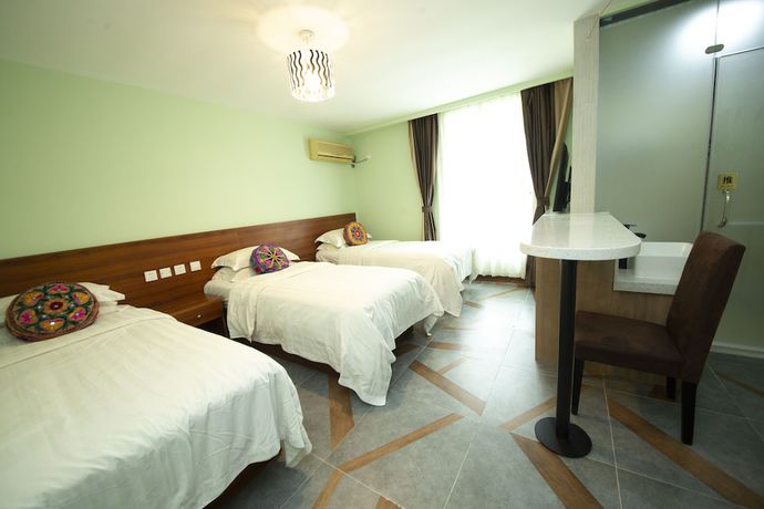 Imagen de la habitación del Hotel Ou Lu Business. Foto 14