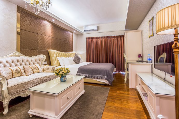 Imagen de la habitación del Hotel Ou Shu Ge Apartment. Foto 4