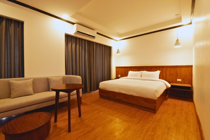Imagen de la habitación del Hotel Oudomsin Vangvieng. Foto 11