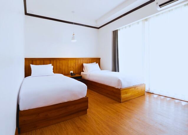 Imagen de la habitación del Hotel Oudomsin Vangvieng. Foto 13