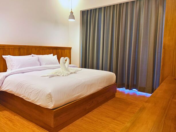 Imagen de la habitación del Hotel Oudomsin Vangvieng. Foto 20