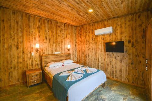 Imagen de la habitación del Hotel &Ouml;l&uuml;deniz Manzara. Foto 14