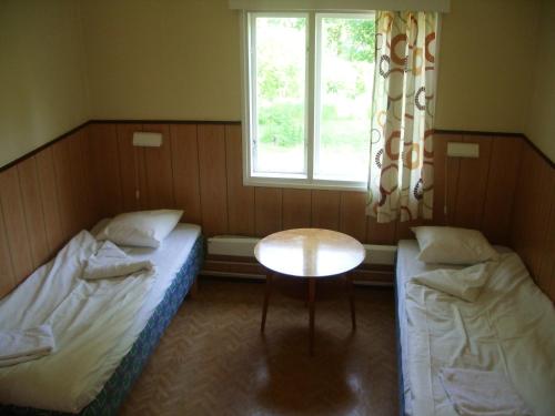 Imagen de la habitación del Hotel &Ouml;vern&auml;sg&aring;rden G&auml;sthem. Foto 9