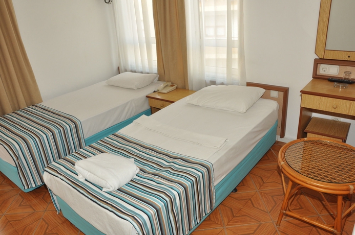 Imagen de la habitación del Hotel Özcan. Foto 8