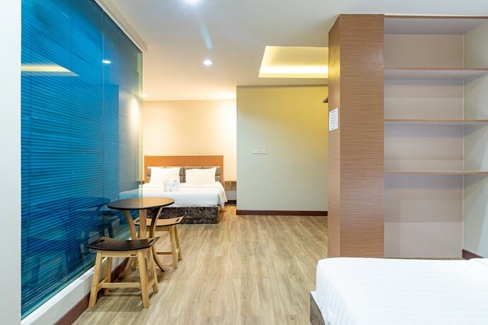 Imagen de la habitación del Hotel Oun Residence. Foto 18