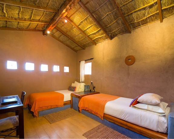 Imagen de la habitación del Hotel Our Habitas Atacama. Foto 10