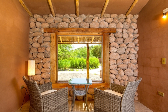 Imagen de la habitación del Hotel Our Habitas Atacama. Foto 13