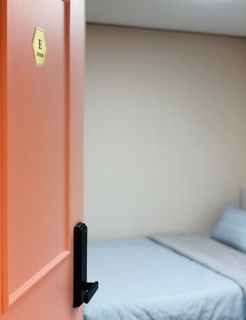 Imagen de la habitación del Hotel Our House. Foto 19