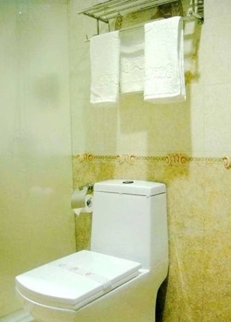 Imagen de la habitación del Hotel Oushang Fengqing. Foto 4