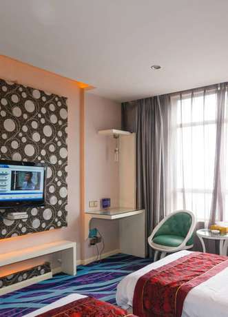 Imagen de la habitación del Hotel Oushang Fengqing. Foto 12