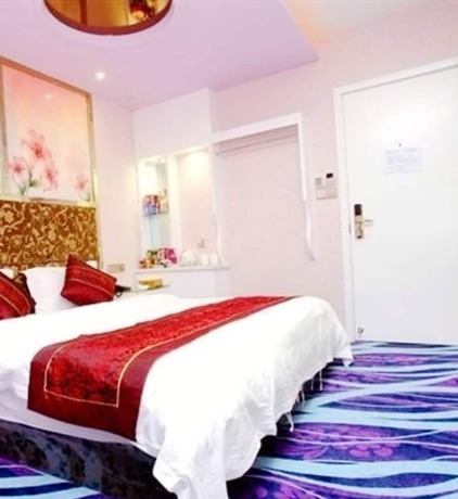Imagen de la habitación del Hotel Oushang Fengqing. Foto 13