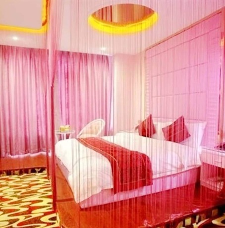 Imagen de la habitación del Hotel Oushang Fengqing. Foto 15