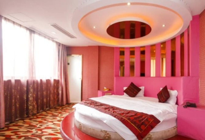 Imagen de la habitación del Hotel Oushang Fengqing. Foto 17