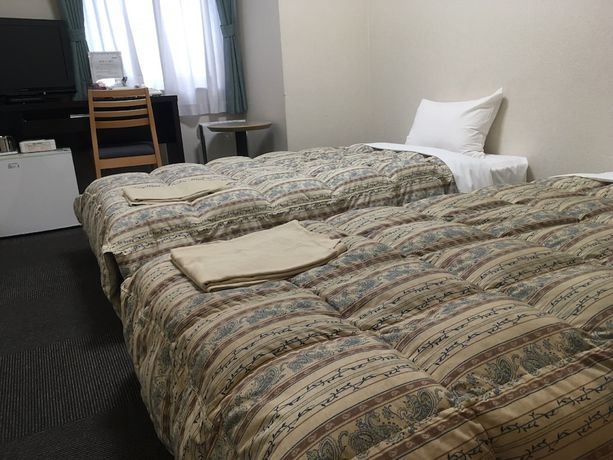 Imagen de la habitación del Hotel Oustat International Tajimi. Foto 4