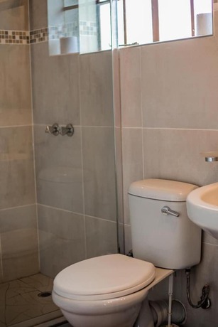 Imagen de la habitación del Hotel Out of Africa Guest House. Foto 17