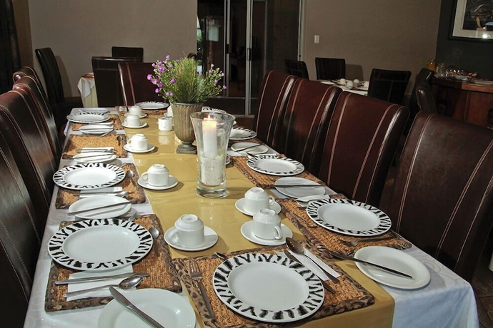 Imagen del bar/restaurante del Hotel Out of Africa Town Lodge. Foto 3