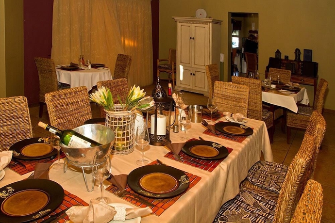 Imagen del bar/restaurante del Hotel Out of Africa Town Lodge. Foto 5