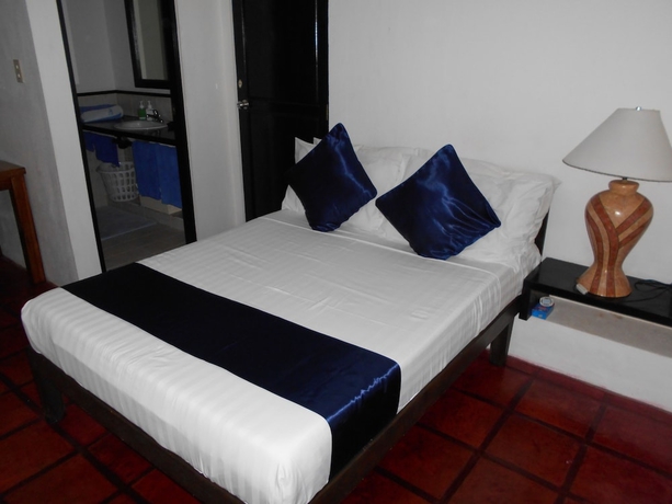 Imagen de la habitación del Hotel Out of the Blue Resort. Foto 10